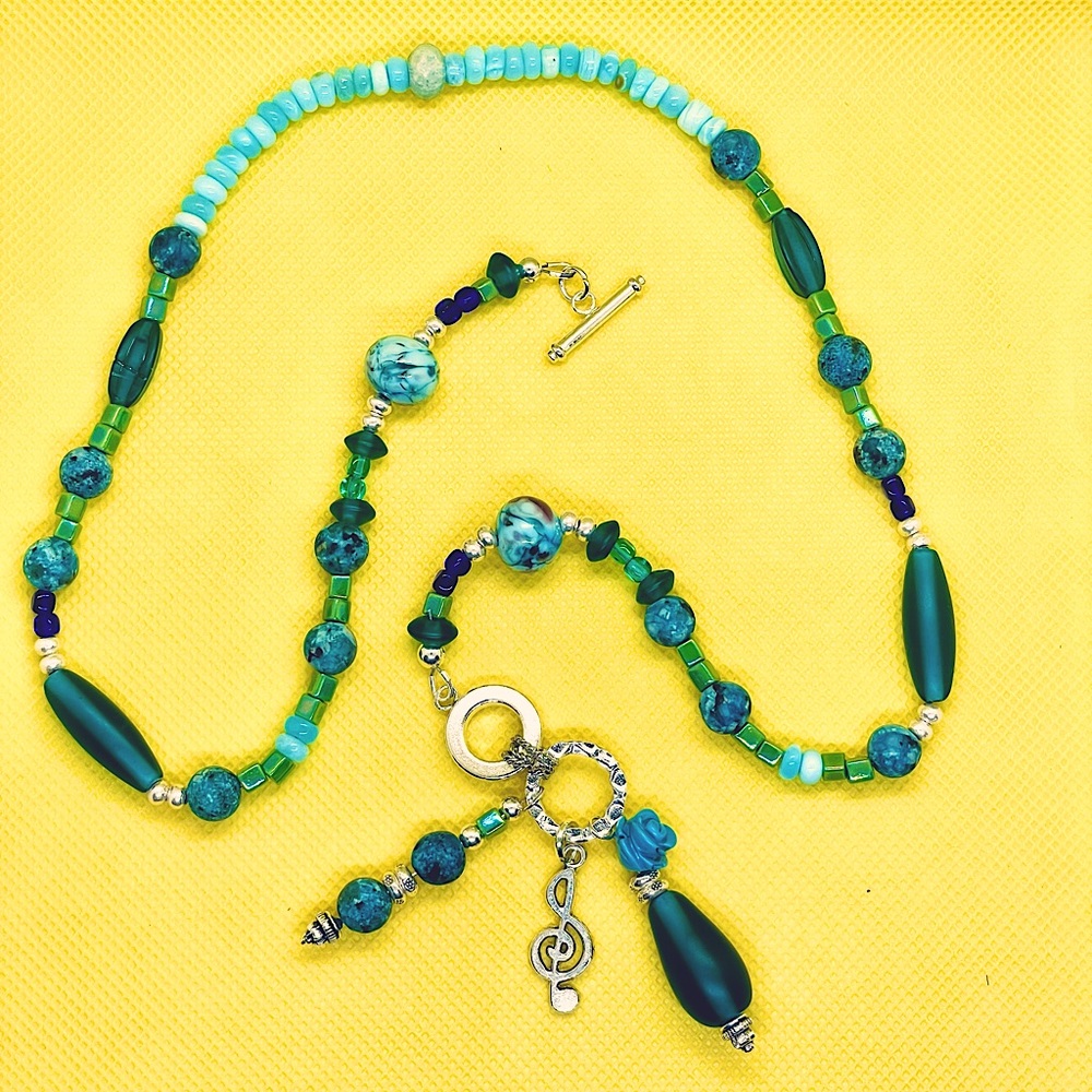 Music lovers Sundance inspired necklace. Pure silver clasp, turquoise stones